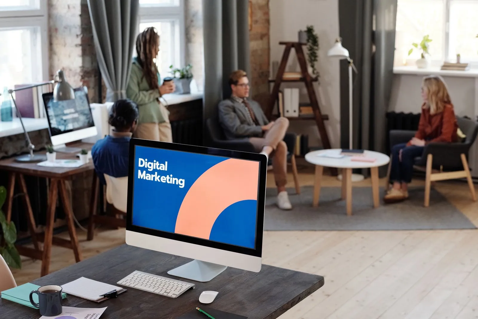 Digital marketing work in progress in a studio office